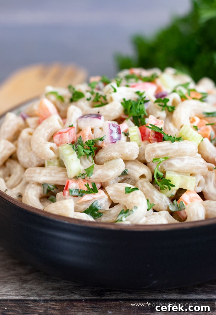 Creamy Gluten-Free Macaroni Salad 3 A close up of gluten free deli style macaroni salad.