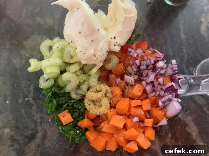 Creamy Gluten-Free Macaroni Salad 6 The macaroni salad ingredients in a large bowl.