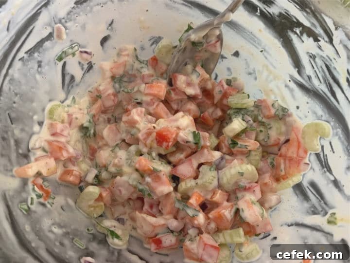 Creamy Gluten-Free Macaroni Salad 7 Mixing the ingredients.