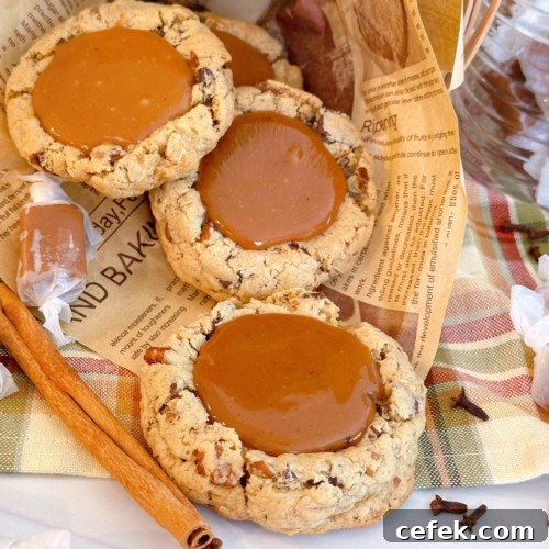 Carmalita Cookies on a paper with cinnamon sticks.