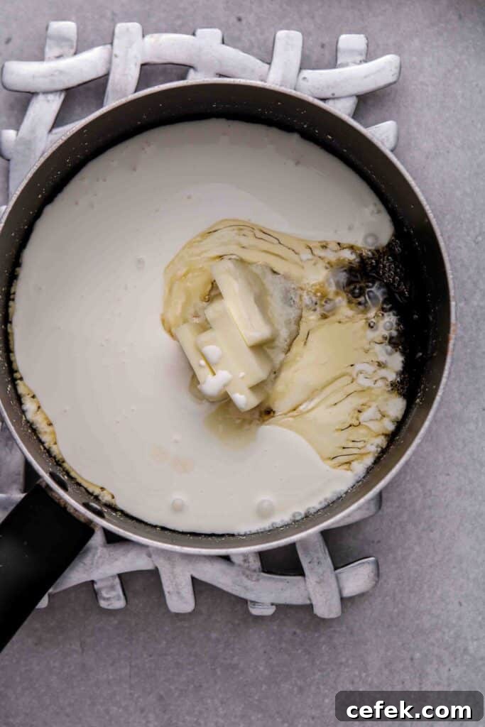 Add cream and butter to caramel