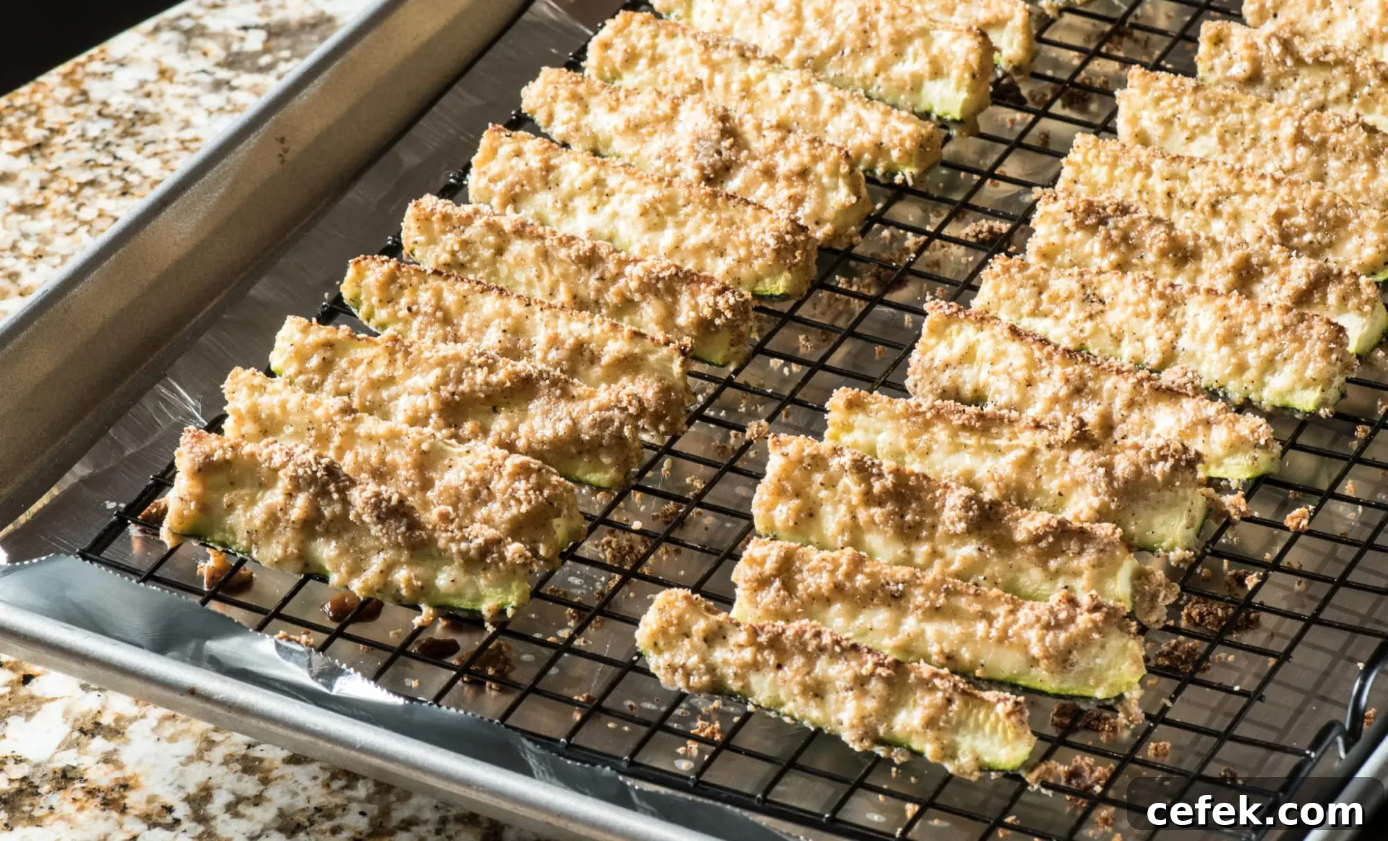 Oven-Baked Zucchini Parmesan Garlic Fries: Crispy Low-Carb Snack 5 Cooked on tray