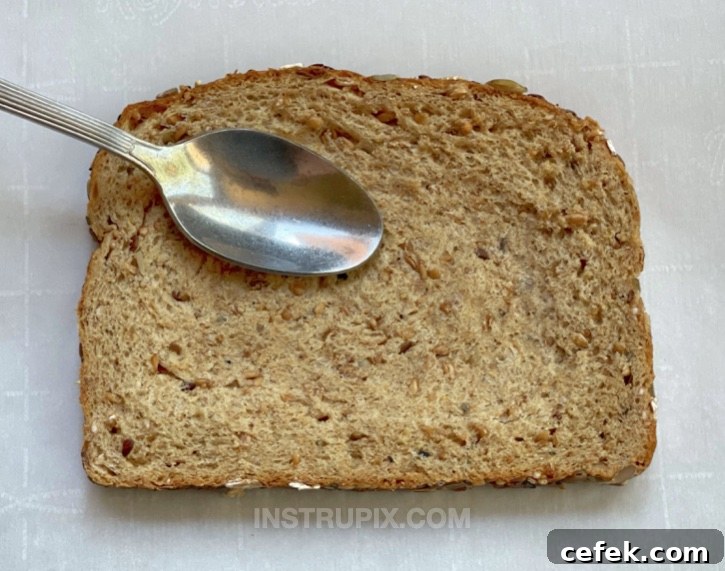 Crispy Toast Topped with Gooey Cheesy Eggs 4 How to make cheesy egg toast in your toaster oven or oven.