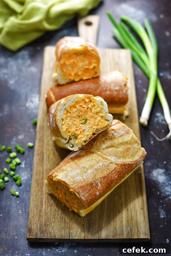 Cheesy Buffalo Chicken Dip Stuffed Bread 4 Buffalo Chicken Dip Stuffed Bread sliced and ready to serve