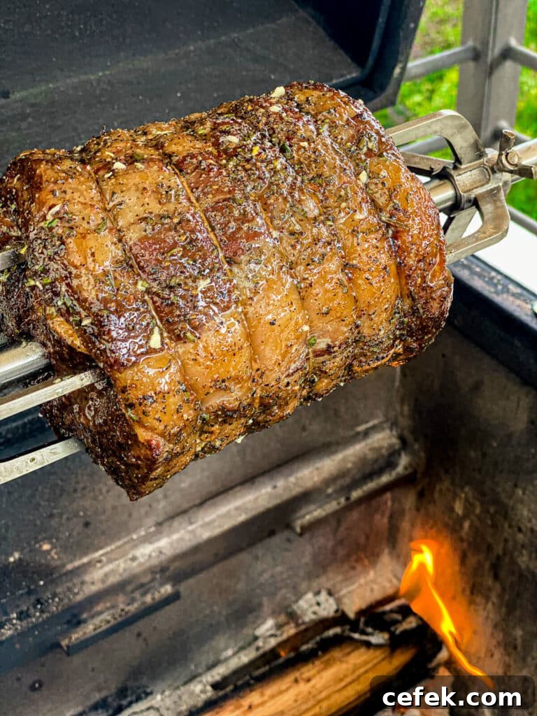 Rotisserie Prime Rib: How to Cook a Tender, Juicy Roast 6 beef roasting over a fire on the grill