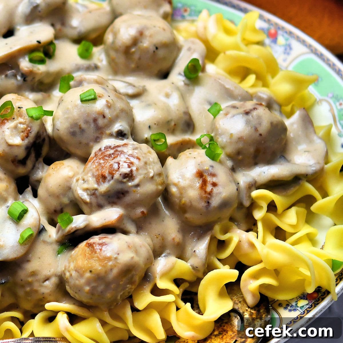 Creamy Meatball Stroganoff with Frozen Meatballs 5 meatball stroganoff on egg noodles served on vintage oval platter
