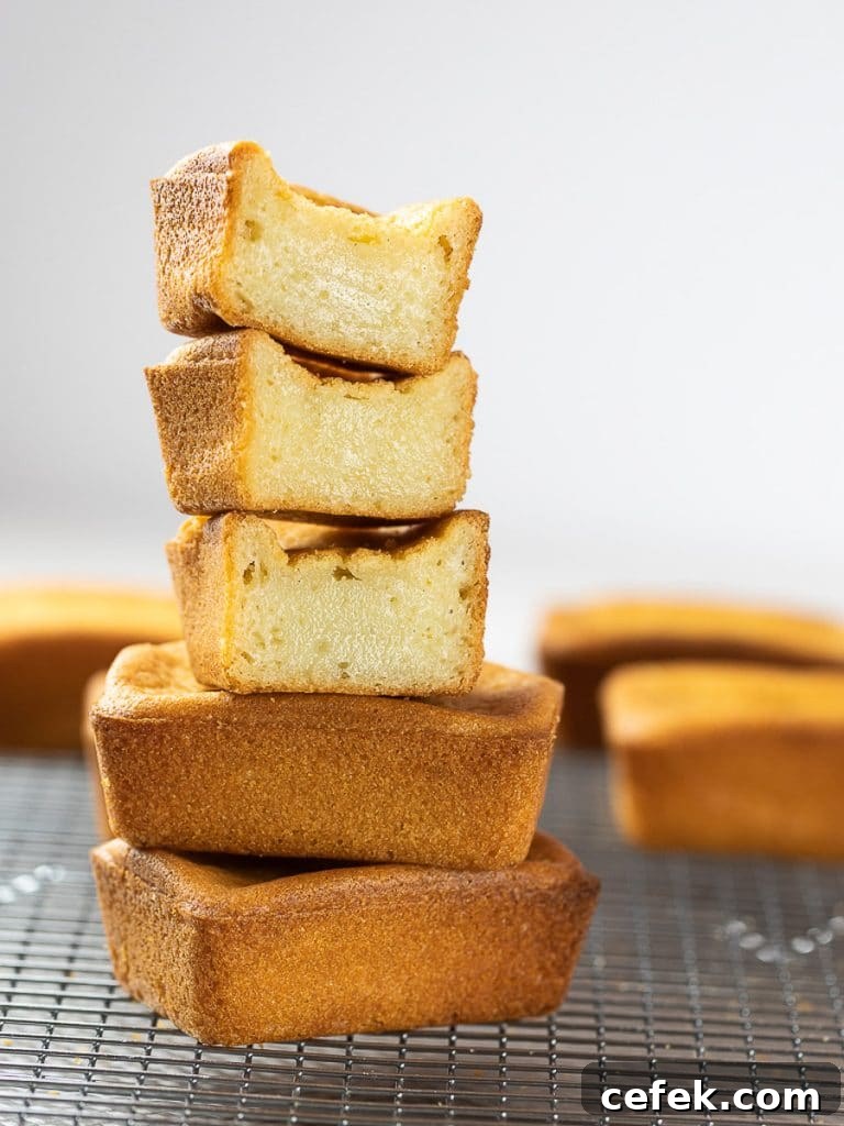 butter mochi stacked on top of a wire rack