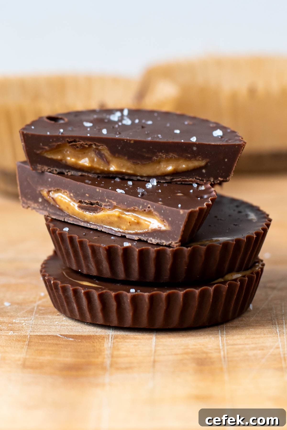 No-Bake 2-Ingredient Peanut Butter Cups 2 Close up of homemade peanut butter cup cut in half with peanut butter filling.