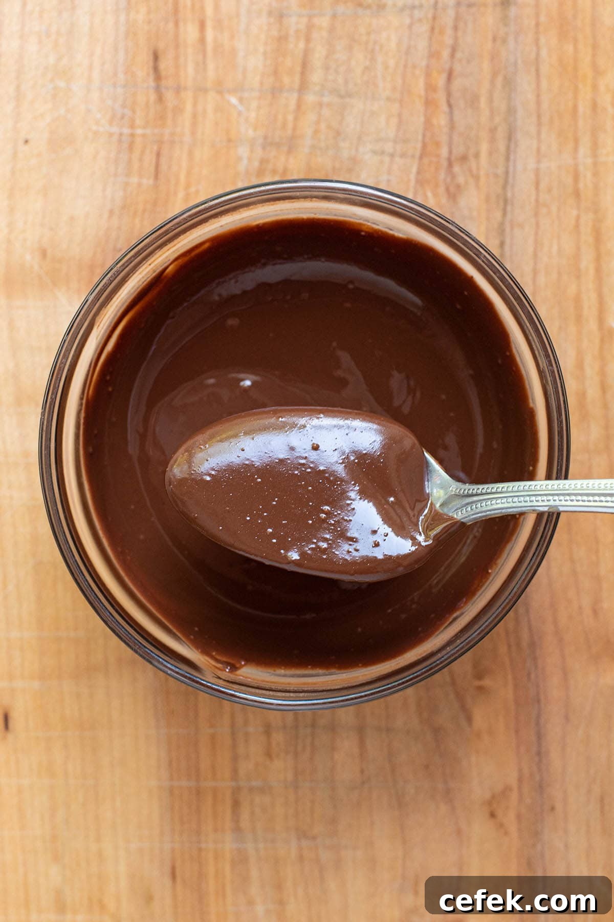 No-Bake 2-Ingredient Peanut Butter Cups 4 Smooth melted chocolate and peanut butter in a small dish.