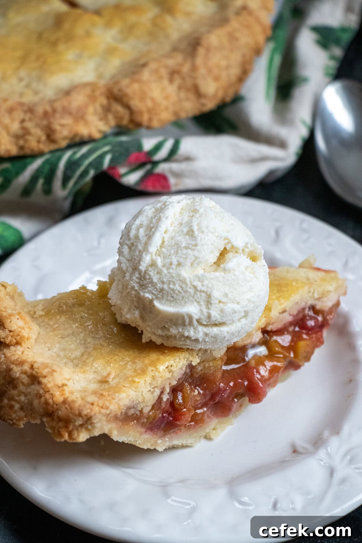Classic Strawberry Rhubarb Pie Recipe 2 Strawberry Rhubarb Pie slice with ice cream