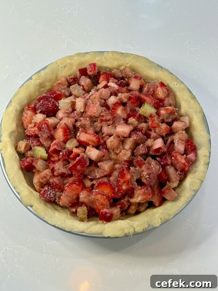 Classic Strawberry Rhubarb Pie Recipe 11 strawberry and rhubarb filling inside the crust