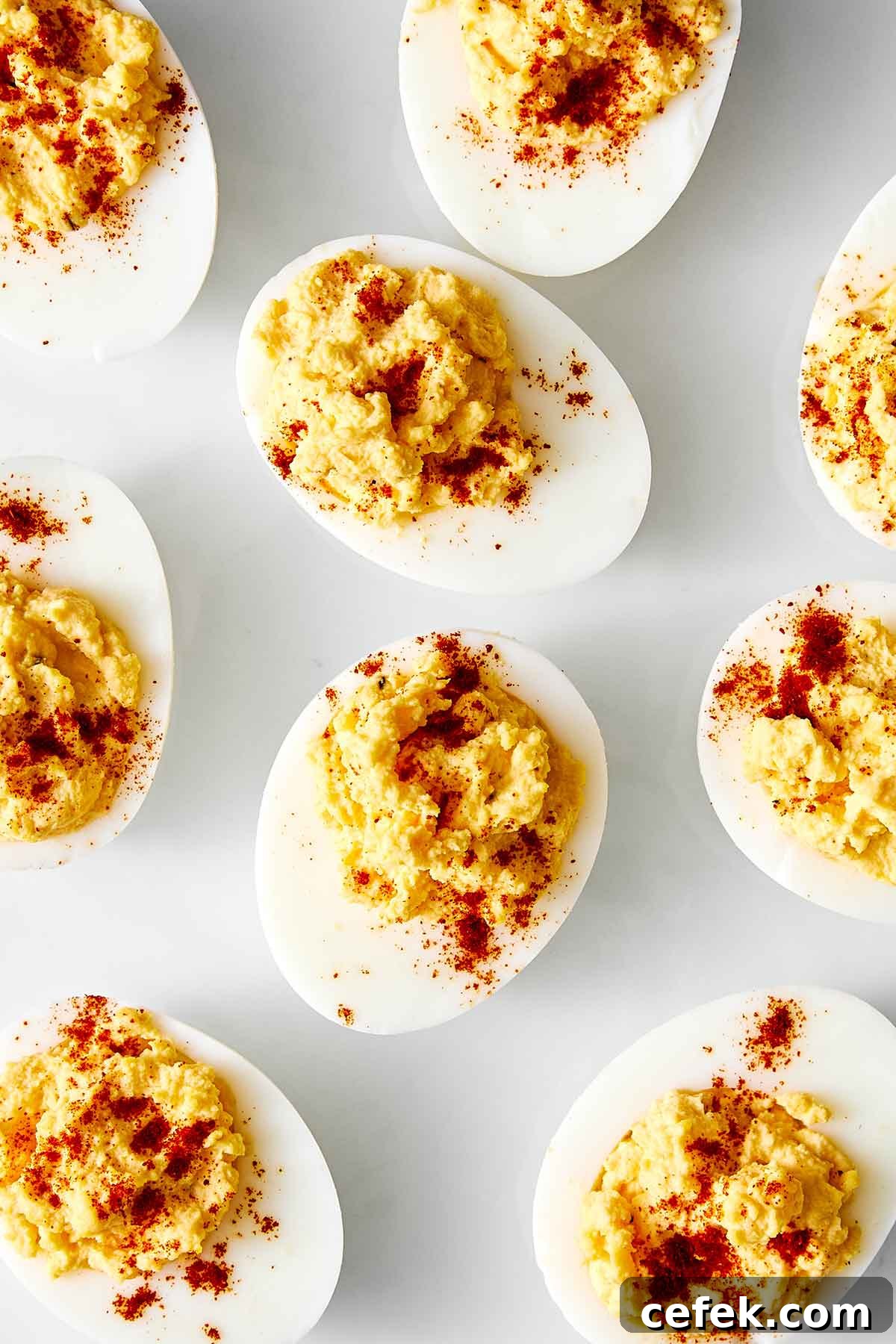Gluten-Free Thanksgiving Menu: Recipes for a Festive Feast 15 Deviled eggs on a white plate.