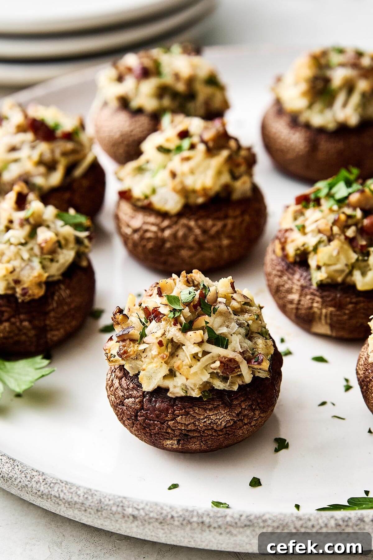 Gluten-Free Thanksgiving Menu: Recipes for a Festive Feast 16 Stuffed mushrooms on a plate.