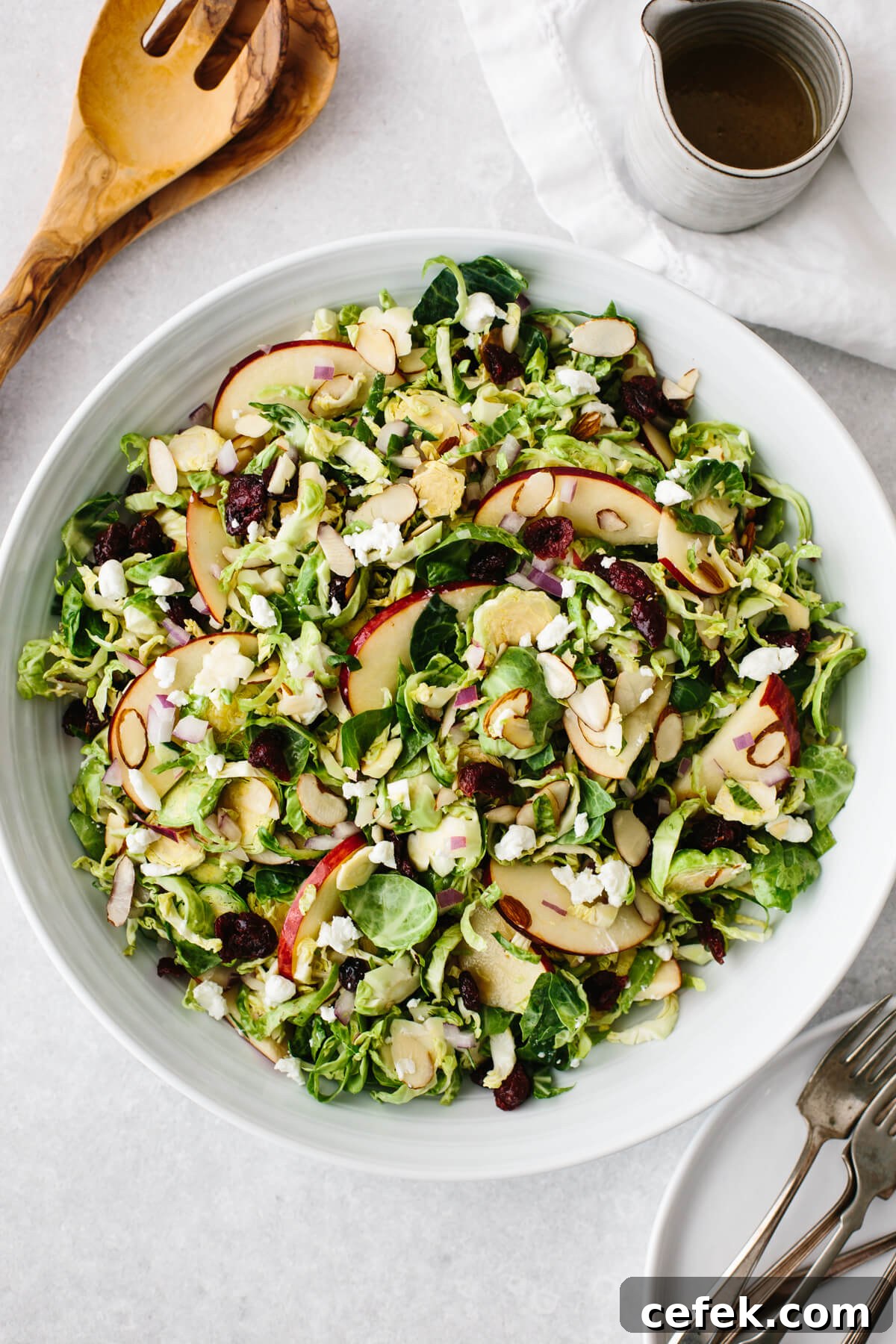 Gluten-Free Thanksgiving Menu: Recipes for a Festive Feast 22 Shaved Brussels sprouts salad in a white bowl.
