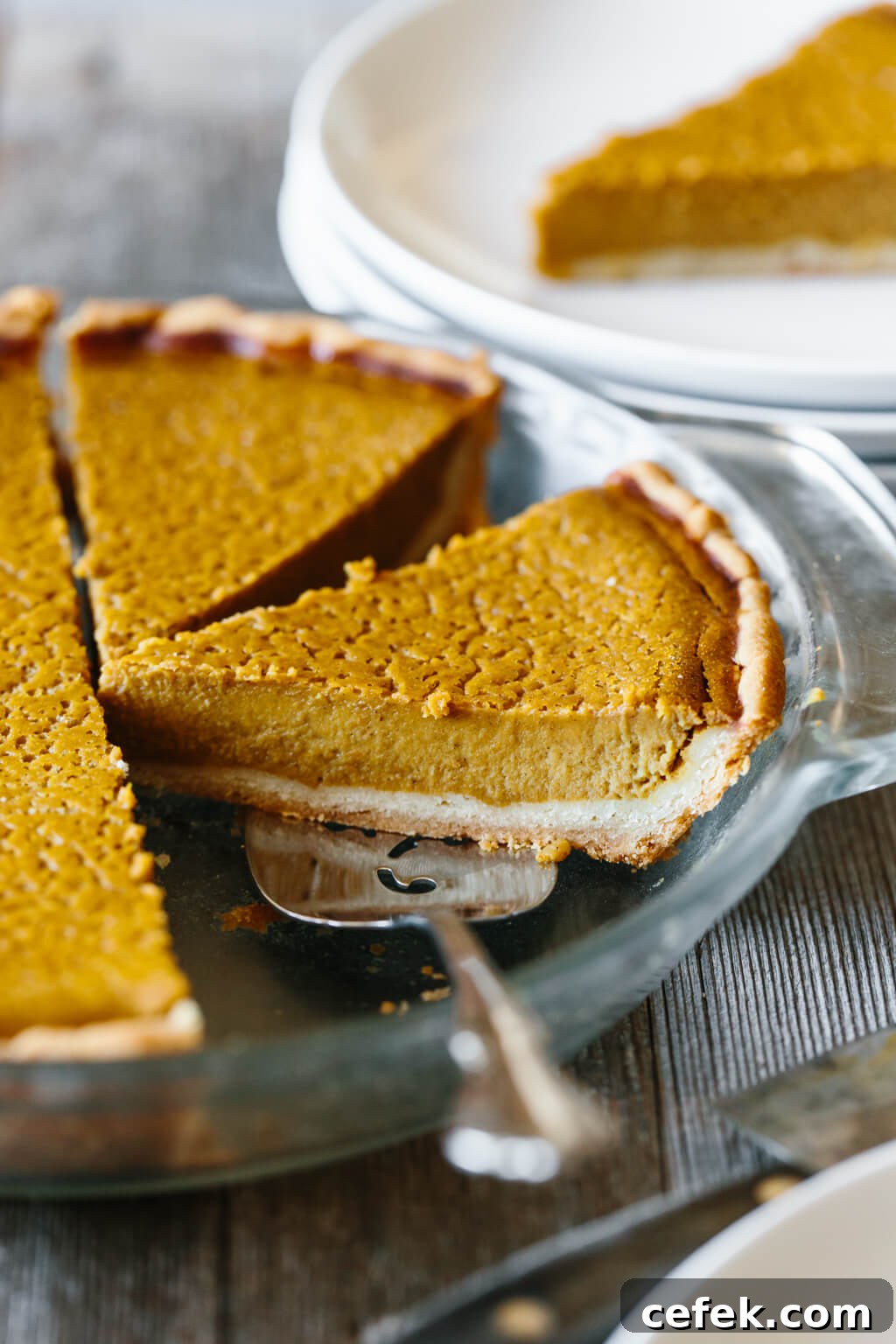 Gluten-Free Thanksgiving Menu: Recipes for a Festive Feast 24 Up close photo of paleo pumpkin pie slice.