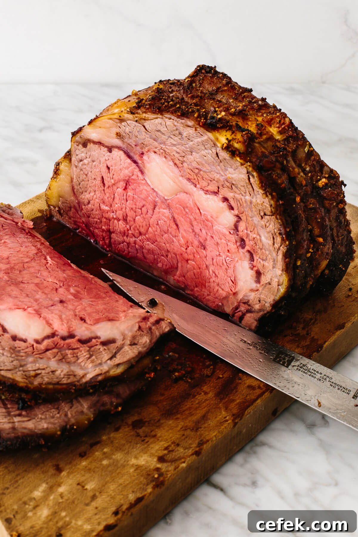 Gluten-Free Thanksgiving Menu: Recipes for a Festive Feast 5 Prime rib sliced on a cutting board.